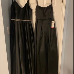 2 black dresses the one on the left is a size 3/4 on the right is size 5.